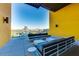 Comfortable rooftop patio with city views, stylish seating, and open-air ambiance at 200 W Portland St # 614, Phoenix, AZ 85003