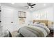 Bright bedroom with en-suite bathroom and ceiling fan at 749 W Southgate Ave, Phoenix, AZ 85041