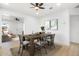 Open concept dining room with a view into the living room at 749 W Southgate Ave, Phoenix, AZ 85041