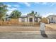 House exterior with a picket fence and street view at 749 W Southgate Ave, Phoenix, AZ 85041