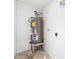 Laundry area with water heater and ample space at 749 W Southgate Ave, Phoenix, AZ 85041