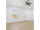 Bright and airy spare bedroom with light wood flooring at 749 W Southgate Ave, Phoenix, AZ 85041