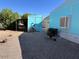 Small backyard with storage shed and fire pit at 9501 E Broadway Rd # 165, Mesa, AZ 85208