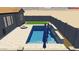 Backyard pool with integrated spa, in ground pool and fire pit offers a desert oasis and is perfect for entertaining at 23461 N 76Th Pl, Scottsdale, AZ 85255