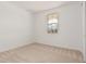 Neutral bedroom with carpet flooring and natural light at 5214 W Rainwater Dr, Laveen, AZ 85339