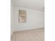 Bright bedroom features a window view and neutral carpet at 5214 W Rainwater Dr, Laveen, AZ 85339