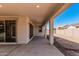 Open-air covered patio area perfect for entertaining and relaxing outdoors at 5214 W Rainwater Dr, Laveen, AZ 85339