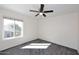 Bright bedroom with carpet flooring and ceiling fan at 15626 N 12Th Ave, Phoenix, AZ 85023