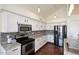 Modern kitchen with stainless steel appliances and granite countertops at 15626 N 12Th Ave, Phoenix, AZ 85023