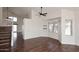 Bright living room with vaulted ceiling, wood floors, and sliding glass door at 15626 N 12Th Ave, Phoenix, AZ 85023