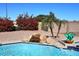 Refreshing pool with waterfall feature and landscaping at 15626 N 12Th Ave, Phoenix, AZ 85023