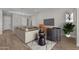 Cozy living room boasts a comfortable couch, modern furniture, and an open layout for relaxed living at 21553 W Pierson St, Buckeye, AZ 85396