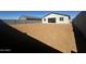 Spacious backyard featuring new construction and block wall fencing at 4301 E Bradford Ave, San Tan Valley, AZ 85143