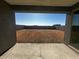 Large backyard with block wall and clear desert view at 4301 E Bradford Ave, San Tan Valley, AZ 85143