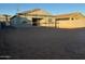 Rear view of house under construction, showing progress at 4301 E Bradford Ave, San Tan Valley, AZ 85143