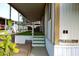 Home exterior showing a covered porch with stairs and cacti at 9333 E University Dr # 89, Mesa, AZ 85207