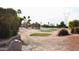 Well-maintained golf greens in a community setting at 9333 E University Dr # 89, Mesa, AZ 85207