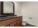 Bathroom with copper sink and dark wood vanity at 13128 N 104Th Pl, Scottsdale, AZ 85260