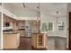 Kitchen with island and stainless steel appliances at 13128 N 104Th Pl, Scottsdale, AZ 85260