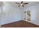 Spacious bedroom with double doors and wood floors at 2090 S Moccasin Trl, Gilbert, AZ 85295