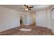 Bedroom with carpet floors and access to bathroom at 2090 S Moccasin Trl, Gilbert, AZ 85295