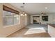 Spacious dining area with tile floor and view to backyard at 2090 S Moccasin Trl, Gilbert, AZ 85295