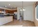 Bright dining area with tile floors and chandelier at 2090 S Moccasin Trl, Gilbert, AZ 85295