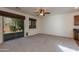 Gathering room with sliding glass door to backyard at 2090 S Moccasin Trl, Gilbert, AZ 85295