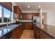 Kitchen with stainless steel appliances and granite countertops at 2090 S Moccasin Trl, Gilbert, AZ 85295