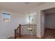 Upstairs hallway with access to bedrooms and bathroom at 2090 S Moccasin Trl, Gilbert, AZ 85295