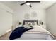 Well-lit bedroom featuring a cozy bed, stylish decor, and ample closet space at 2507 E Buffalo St, Chandler, AZ 85225