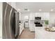 Modern kitchen with stainless steel appliances and white cabinets at 2507 E Buffalo St, Chandler, AZ 85225