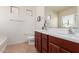 Bathroom featuring double sinks and tile flooring at 3468 E Desert Moon Trl, San Tan Valley, AZ 85143