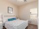 Serene bedroom with light and bright furnishings at 3468 E Desert Moon Trl, San Tan Valley, AZ 85143