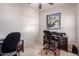 Home office with a desk, chair, and artwork at 3468 E Desert Moon Trl, San Tan Valley, AZ 85143