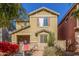 Two-story house with red door and landscaping at 4354 E Rosemonte Dr, Phoenix, AZ 85050