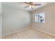 Bedroom featuring tile flooring and ceiling fan at 13235 N 25Th Dr, Phoenix, AZ 85029