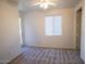 Bedroom with sliding door to patio access at 1131 W Auburn St, Mesa, AZ 85201