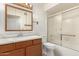 Bathroom featuring wood cabinet, modern sink and shower/tub combo offers a clean and functional space at 542 S Higley Rd # 99, Mesa, AZ 85206