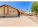 Charming single-story home with a well-maintained lawn and a two-car garage in a quiet neighborhood at 542 S Higley Rd # 99, Mesa, AZ 85206