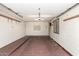 This garage has shelving, electrical outlets, and a map on the back wall at 542 S Higley Rd # 99, Mesa, AZ 85206