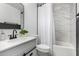 Elegant bathroom with white marble tile, modern fixtures, and a stylish vanity at 8913 E Oro Cir, Mesa, AZ 85212