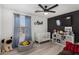 Stylish room featuring modern furniture and a playful arrangement of toys and decor at 8913 E Oro Cir, Mesa, AZ 85212