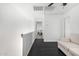 Bright loft area with dark floors and neutral walls, perfect for relaxing or entertaining at 8913 E Oro Cir, Mesa, AZ 85212