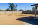 A spacious backyard featuring a block wall and a large open area is perfect for outdoor activities at 2007 N 67Th Dr, Phoenix, AZ 85035