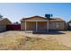 A covered patio overlooks the backyard, offering a serene and private outdoor space at 2007 N 67Th Dr, Phoenix, AZ 85035