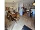 Bright dining room with a large wooden table and chandelier at 7801 E Davenport Dr, Scottsdale, AZ 85260