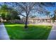 Lush green grass and trees overlooking the community pool area and condos at 8241 N Central Ave # 24, Phoenix, AZ 85020