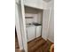 Laundry closet with a white washer and dryer with bi-fold doors at 8241 N Central Ave # 24, Phoenix, AZ 85020