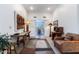 Bright hallway with seating area and southwestern decor at 9177 E Sunflower Ct, Scottsdale, AZ 85266